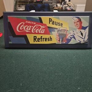 Coca-Cola Refresh Sign with Red and Yellow Accents